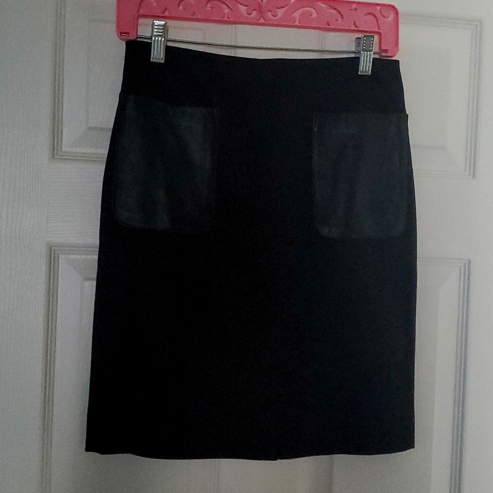 Black skirt with leather pockets